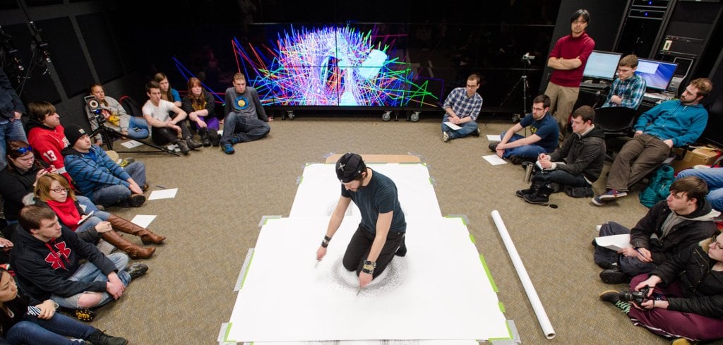 Performance artist Tony Orrico creates a graphite drawing mirrored by sound and visuals through the Immersive Interactive Sonification Platform (ilSoP).