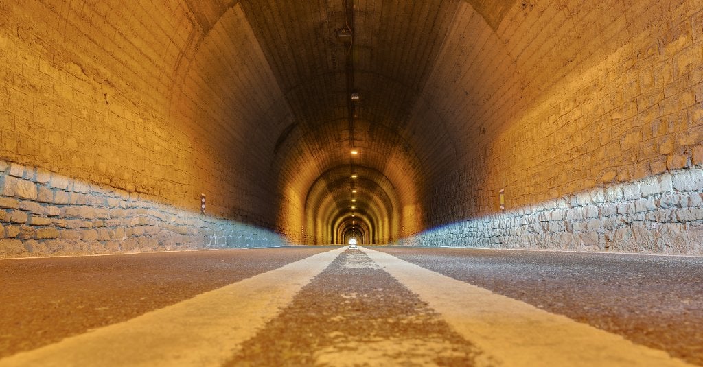 The movement of ions in manganese dioxide tunnels is similar to cars moving through human-made tunnels like this one in Spain. Credit: Diego Delso, Wikimedia Commons, License CC-BY-SA 4.0