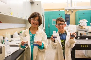 Kiddos 2 Cat and Lewis Vendlinski learned how to measure the concentration of phosphorus in water samples using a set of standards.