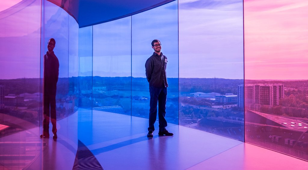 Learning to do interdisciplinary, international research takes students to Denmark this summer, where they'll get new views on collaborative research in the lab and from the colored-glass walkway at the Aros Art Museum. Credit: Taran Schatz
