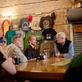 A group people around the bar at Keweenaw Brewing.