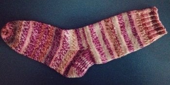 A hand knit sock.