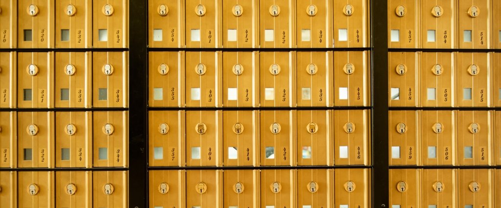 A wall of mailboxes. 