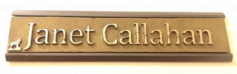 nameplate reads: Janet Callahan