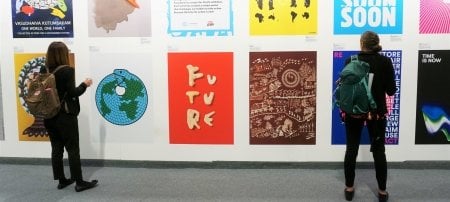 Students observe an art installation in one of the halls at COP25. Image Credit: Jessica Daignault