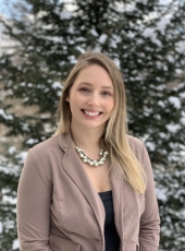 smiling woman in a blazer