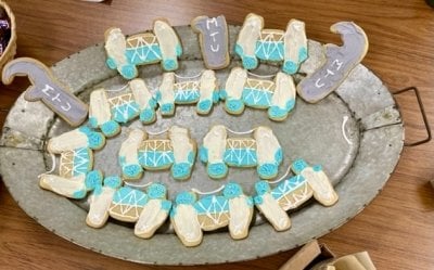 Cookies in the shape of the Portage Lake Lift Bridge and wrenches on a cookie plate in a student design cookie cutter contest.