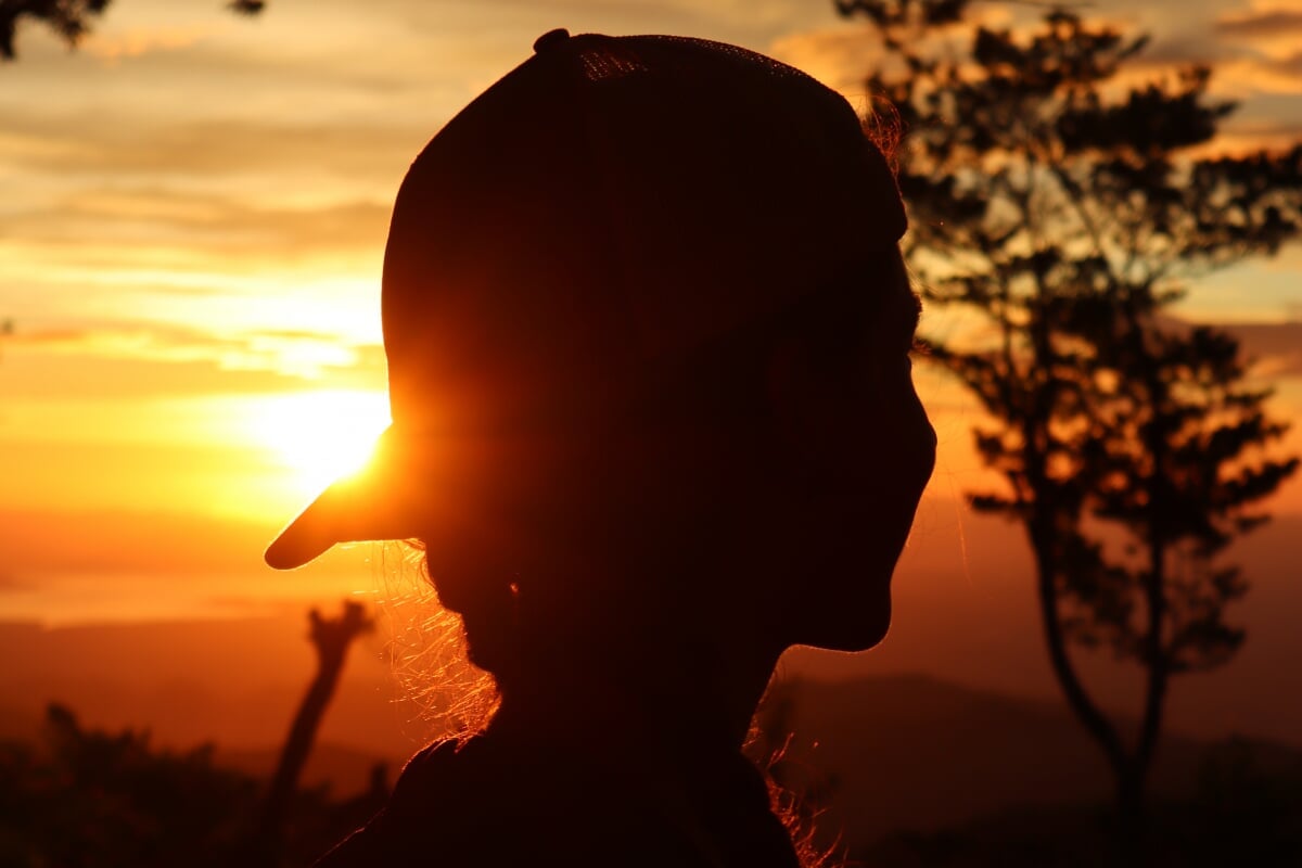 A young sustainability advocate in a Costa Rican sunset.