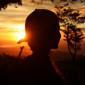 A young sustainability advocate in a Costa Rican sunset.