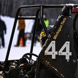 Michigan Tech's No. 44 Blizzard Baja student-built car on the outdoor snow and ice track