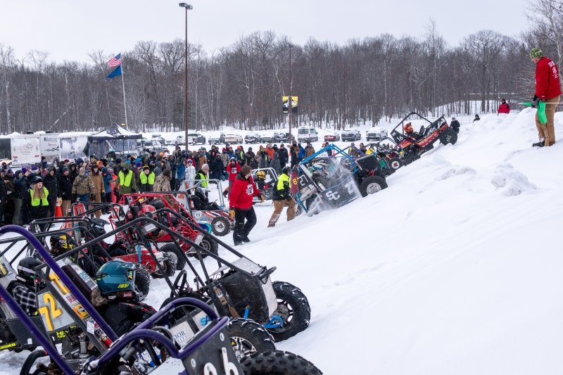 Competitors test their hill-climbing skills on Michigan Tech's Winter Baja course.