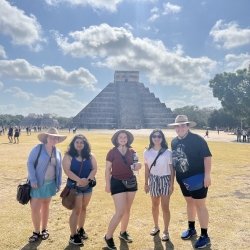 Four MTU Huskies at ancient ruins that are a UNESCO world heritage site in the Yucatan Peninsula.