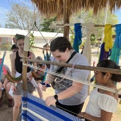 Students learn how to make hammocks from a village community member in Yucatan.