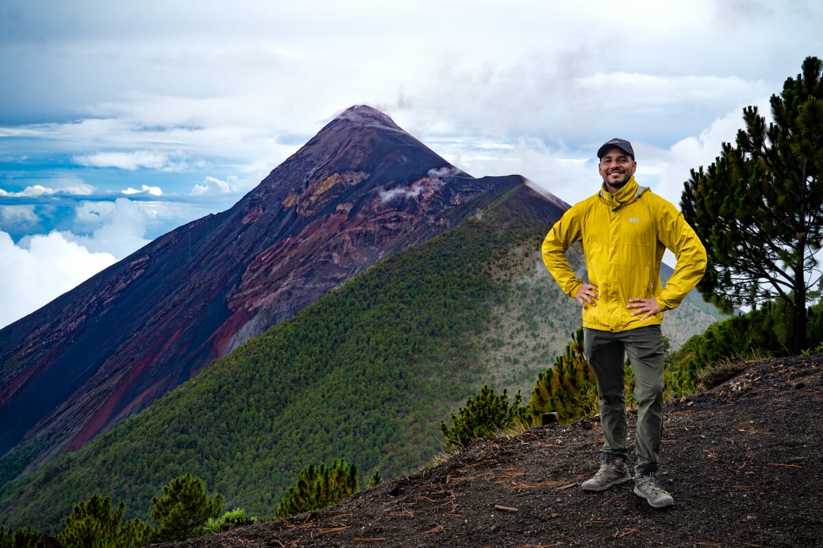 Gustavo Bejar-Lopez in front of a volcano.
