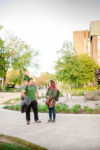 Students on Michigan Tech campus visiting information tables