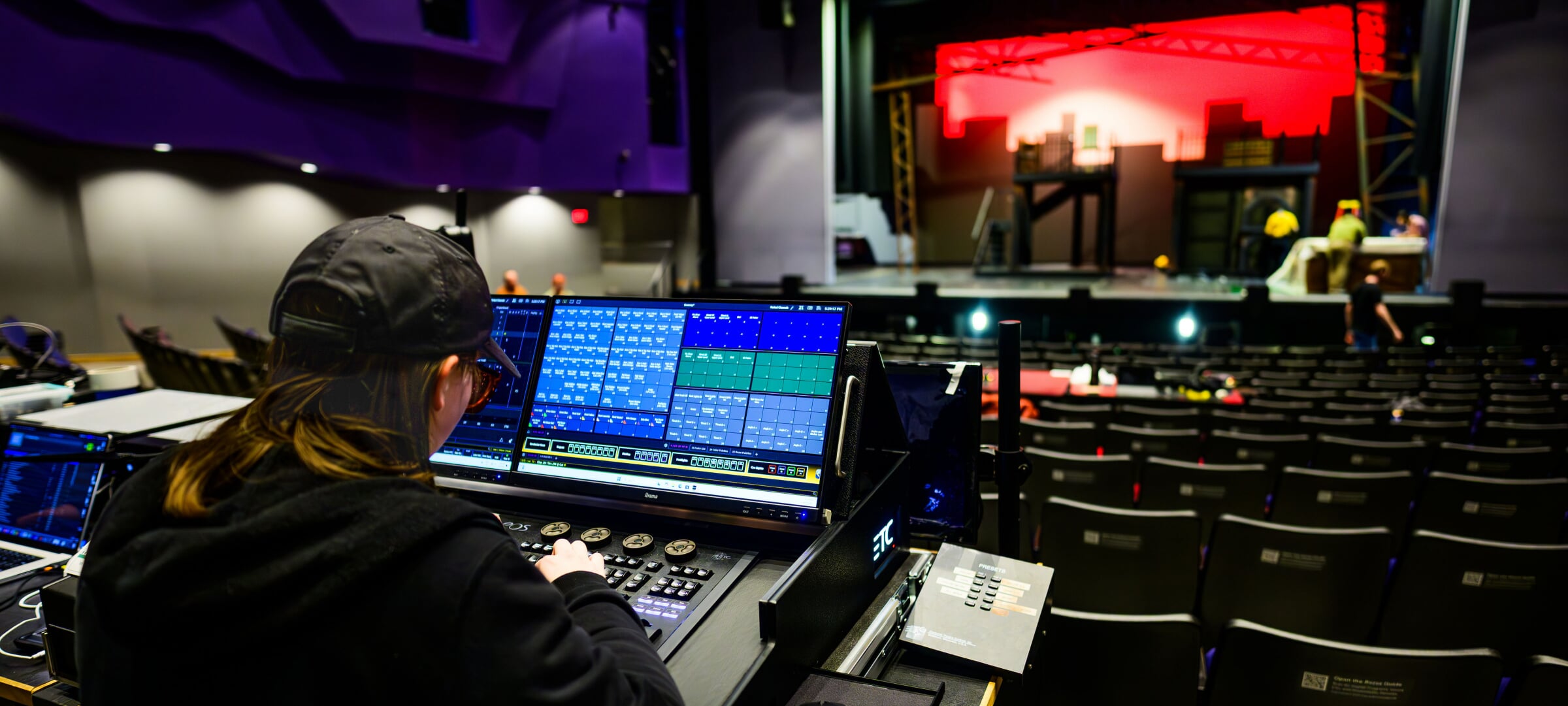 Student configures and tests a theatre control board