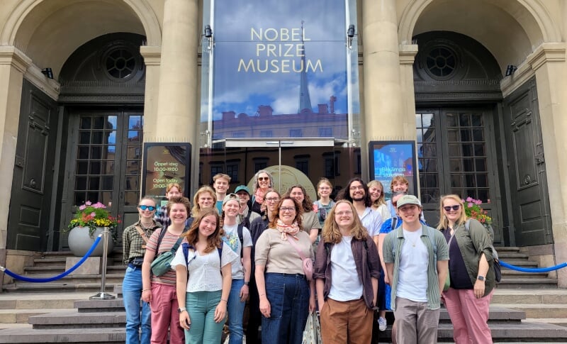 Students and faculty on stairs of Nobel Prize museum