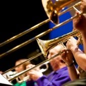 Musicians playing trombones.