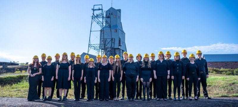 Singers outside Quincy Mine