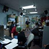 Students recording inside the sound lab
