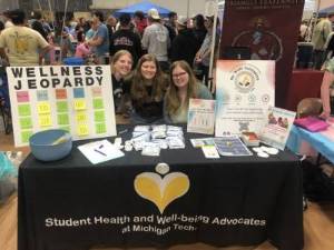 well-being advocates at a table