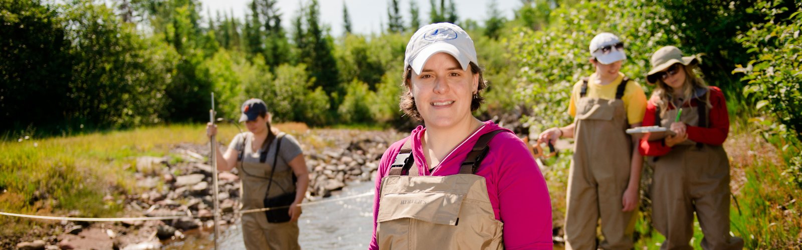 Amy Marcarelli doing research at a stream.